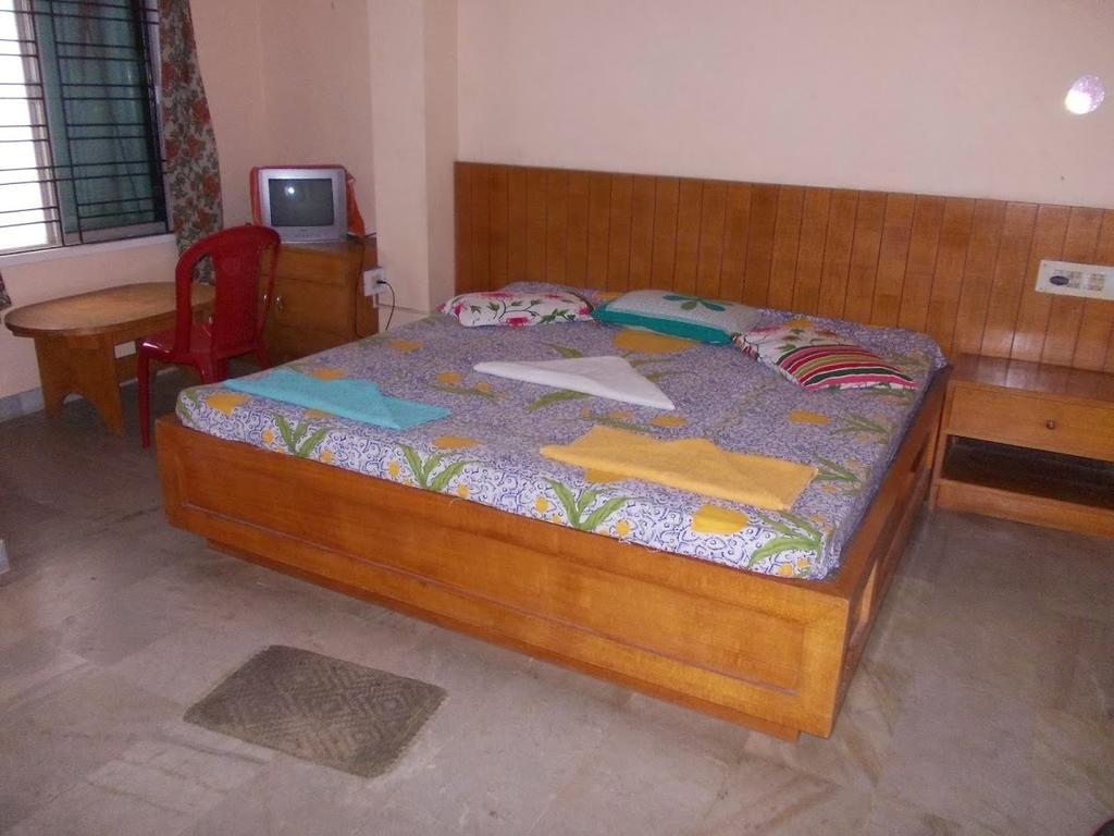 Rishaan Guest House Пури Номер фото